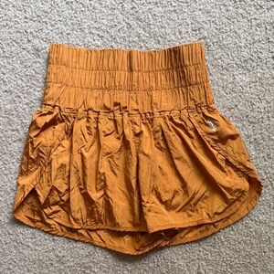 FP Movement by Free People Smocked Waist Athletic Skort in Rust Orange